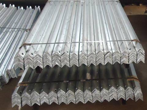 Galvanized palisade fence steel angle tied together with strapping.